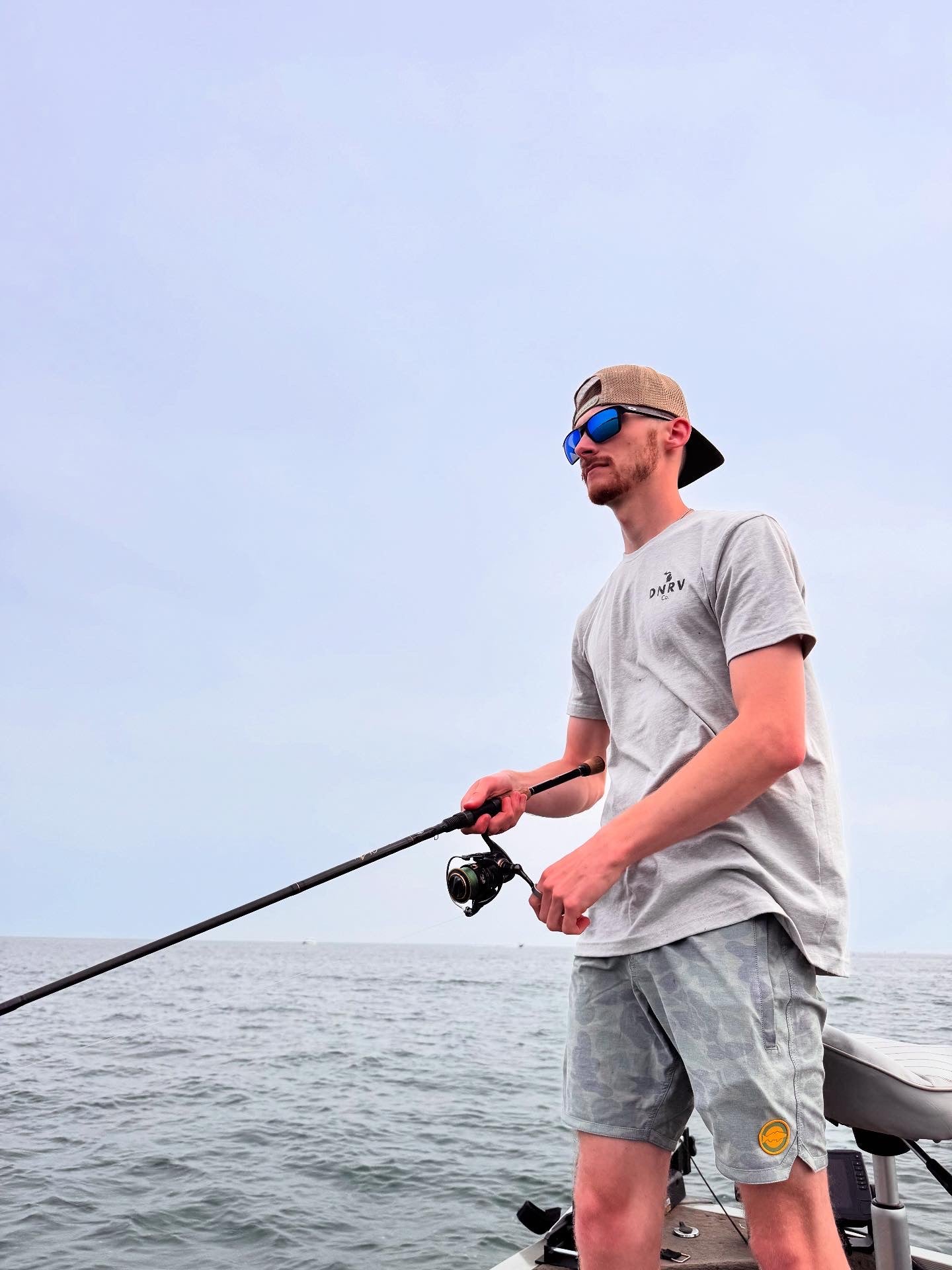 DNRV Co. founder fishing from a boat